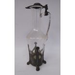 An early 20thC clear glass wine jug, having a long, narrow neck and loop handles,