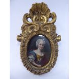 A late 18thC head and shoulders portrait miniature, a woman wearing period costume 3'' x 2.