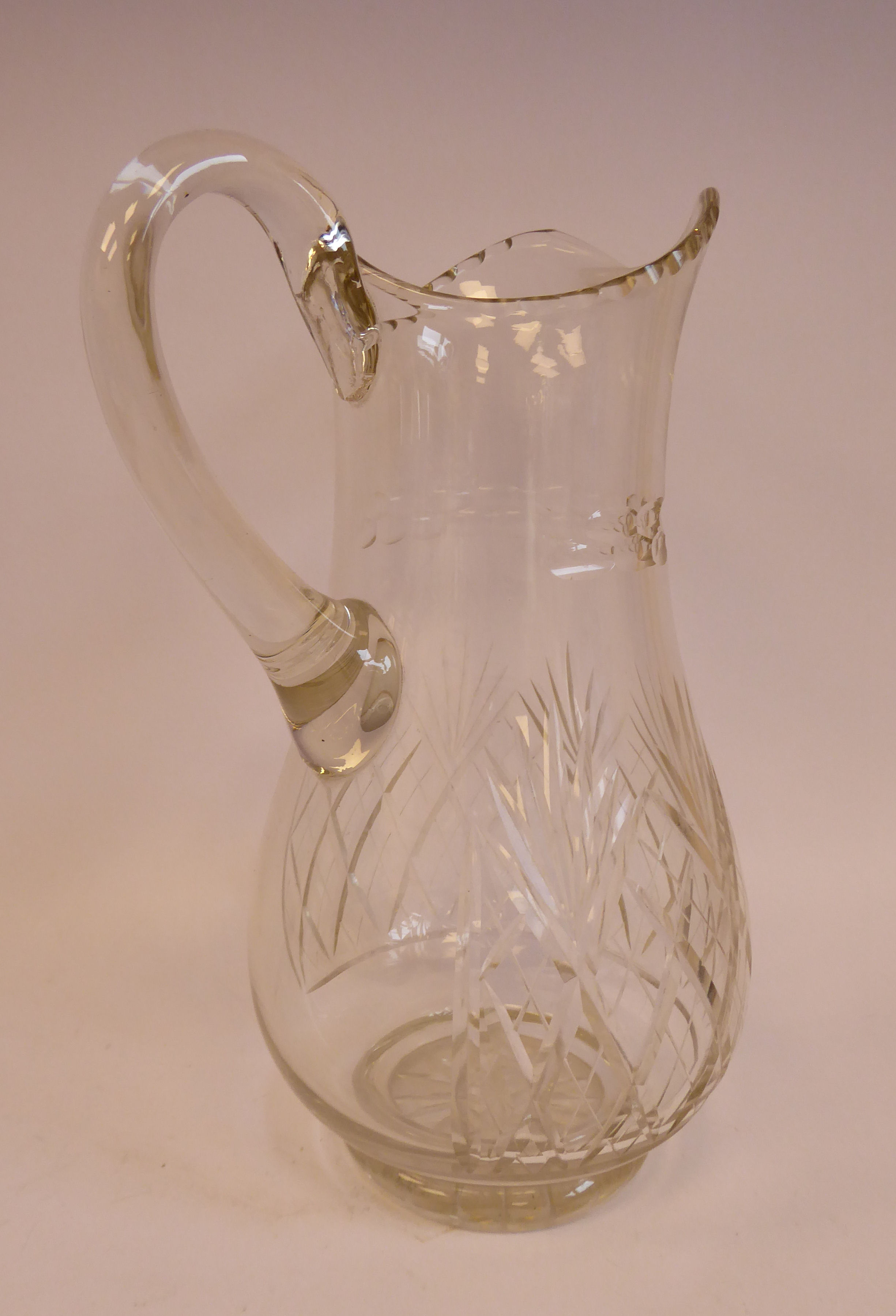 A late 19th/early 20thC crystal cordial jug of waisted baluster form with a drawn loop handle, - Image 4 of 6