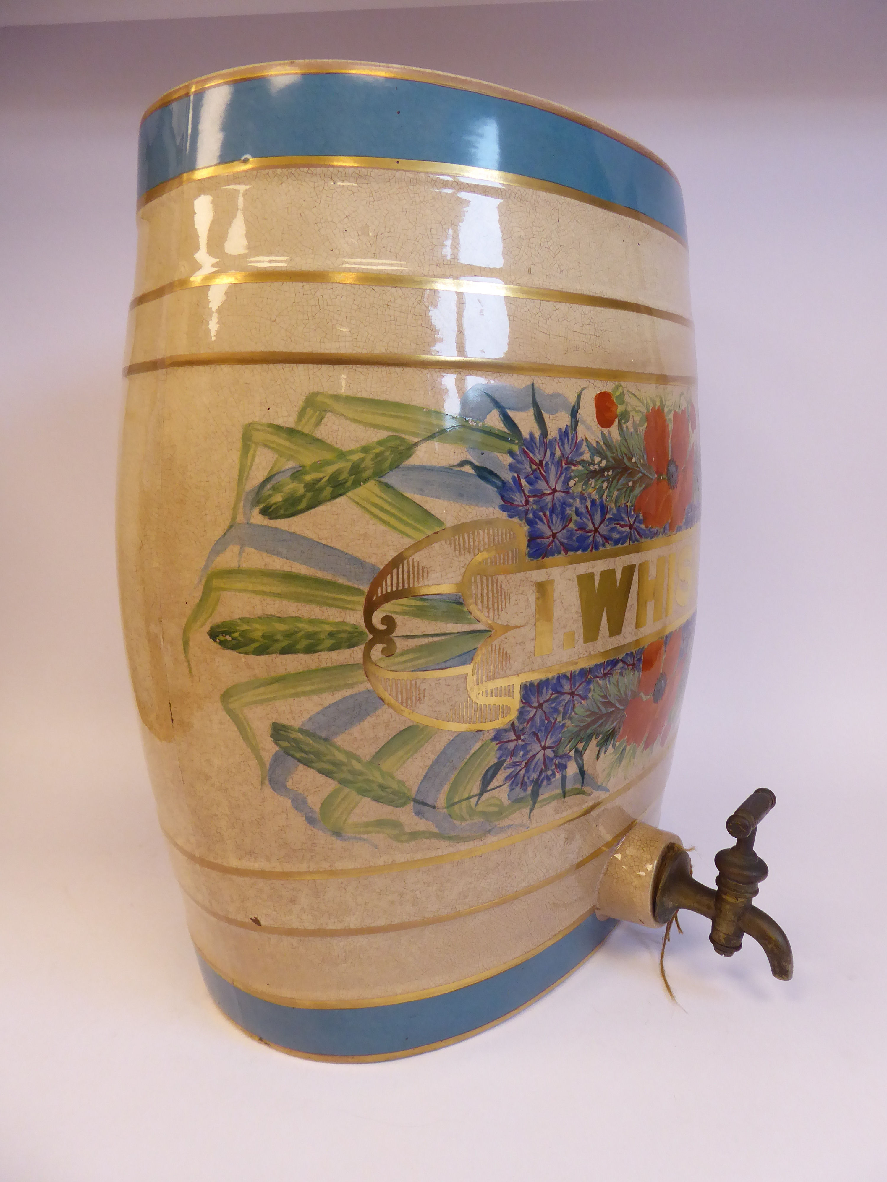 A late 19thC cream coloured pottery, oval barrel design bar room dispenser, - Image 3 of 7