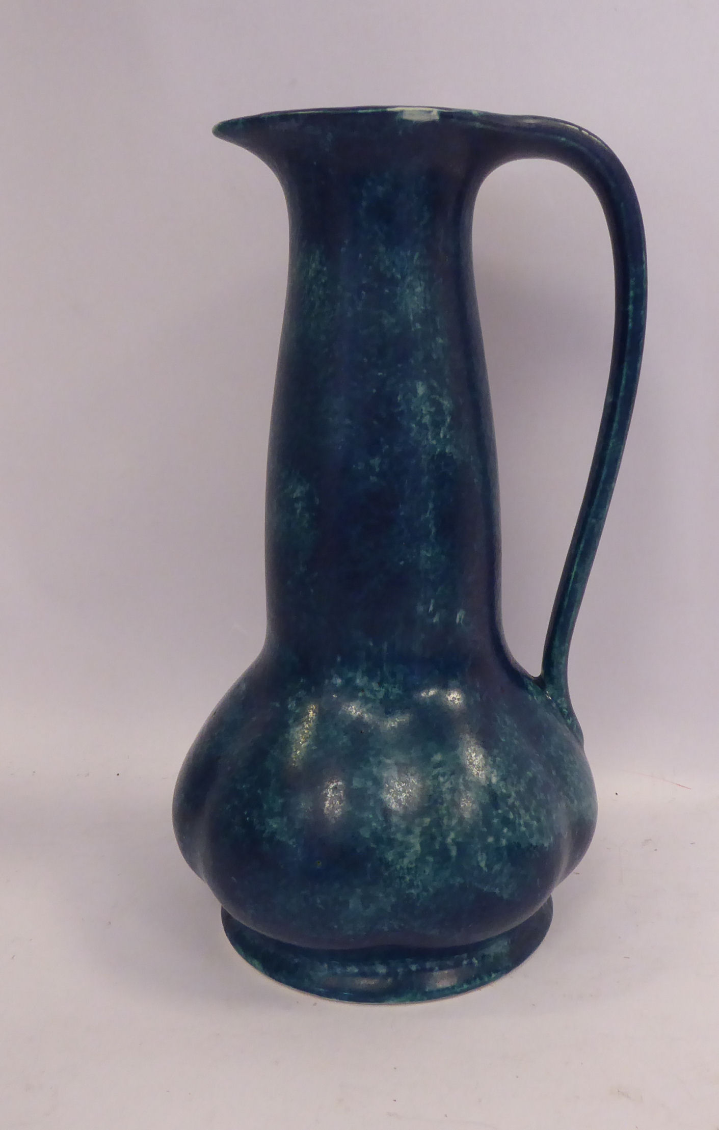 A George Cartilidge, Hancock & Sons, Morris Ware pottery jug of segment moulded, squat,