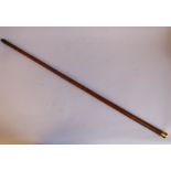 A late Victorian gentleman's malacca walking cane with an 18ct gold cap terminal (Birmingham 1892)