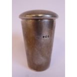 An apothecary's silver and parcel gilt travelling combination miniature beaker,