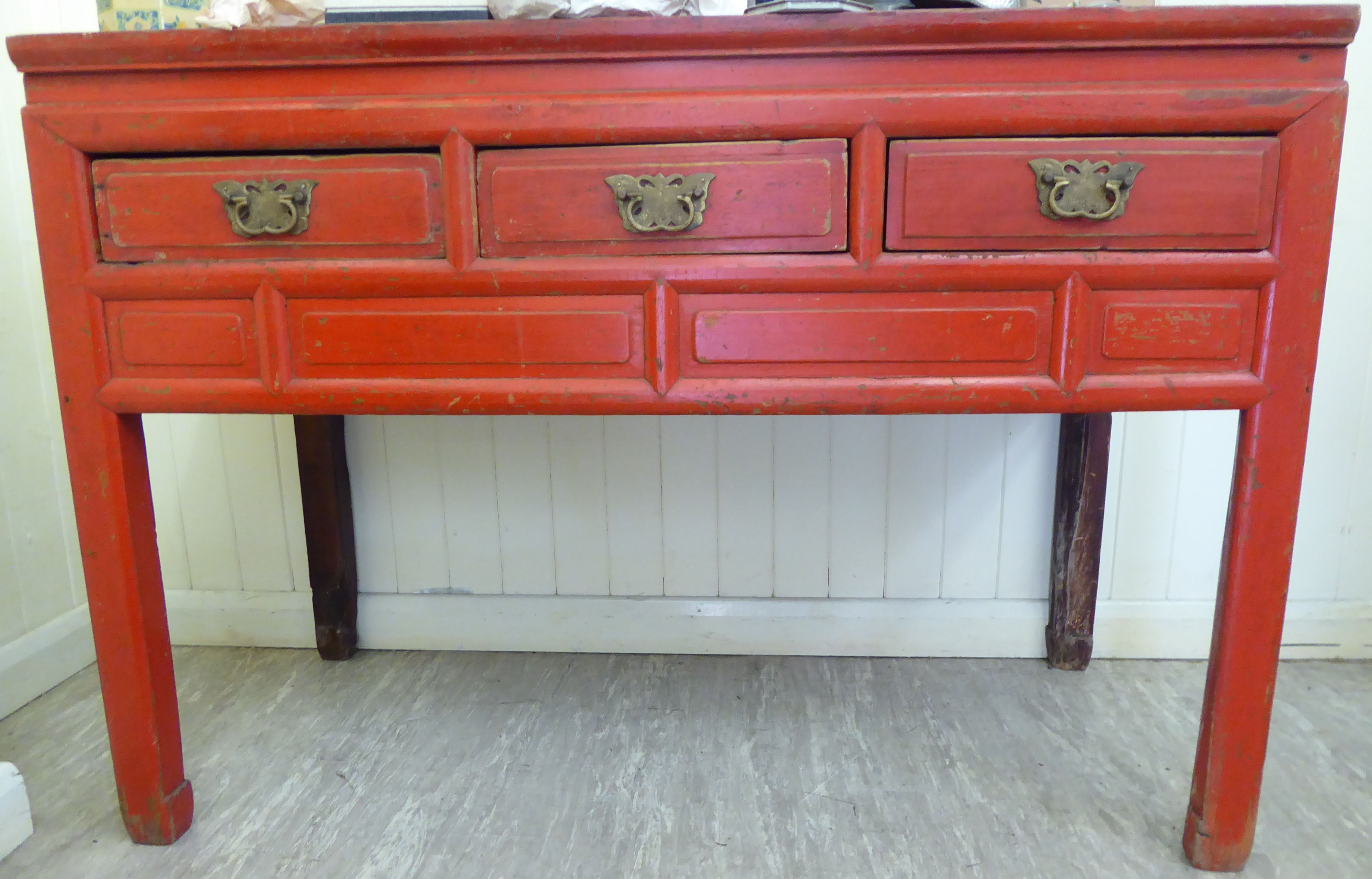 A modern Chinese lacquered red elm traditional side table with a mitred top,