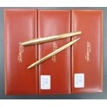 Three Dupont gilt metal ballpoint pens,