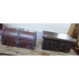 Two similar 'antique' Indonesian teak and cast iron mounted caskets largest 9''h 22''w BSR