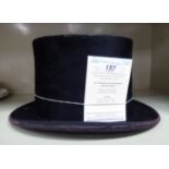 A Walter Barnard & Son black silk top hat 24'' circumference OS2