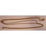 A Victorian gold coloured metal guard chain,