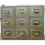 A modern oak finished nine drawer desktop file index card cabinet 13''h 16''w CA