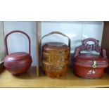 Three similar 20thC Japanese red lacquered and gilded food containers of various sizes and forms