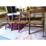 A set of four conjoined 1930s oak folding theatre chairs 74''w LAF