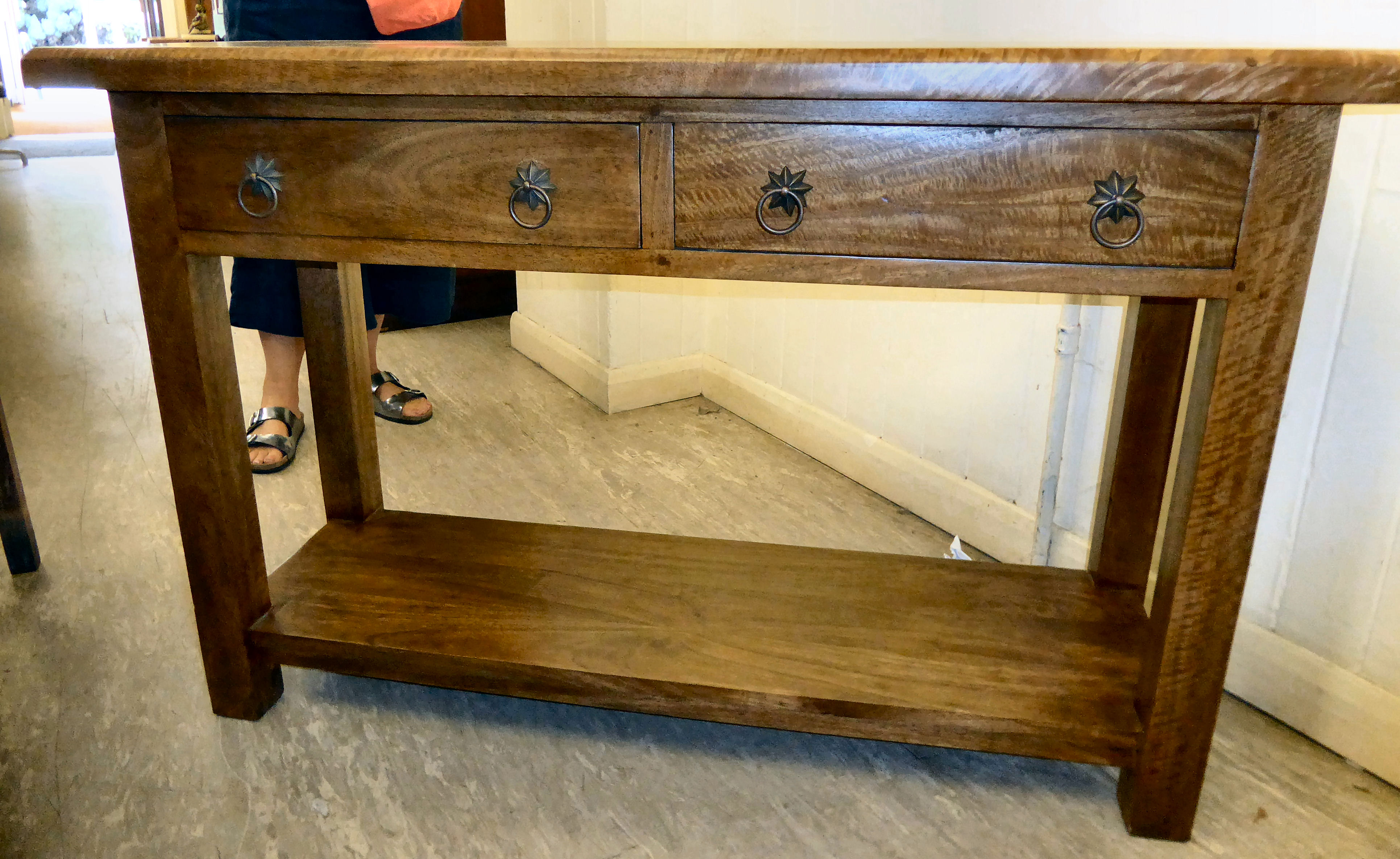 A modern Oriental light coloured hardwood side table with a parquetry top, over two in-line drawers,