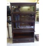 1920s stained oak cased four section Globe Wernicke bookcase,