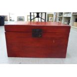 A modern Chinese lacquered red, boarded elm box with straight sides,