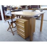 A modern beech and pine four drawer single pedestal desk,