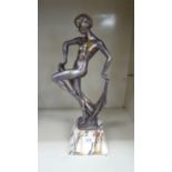 Timousin - an Art Deco silver plated figure, a dancing nude, on a chamfered,