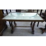 A modern mahogany finished coffee table, the glazed framed top set with a map of Great Britain,