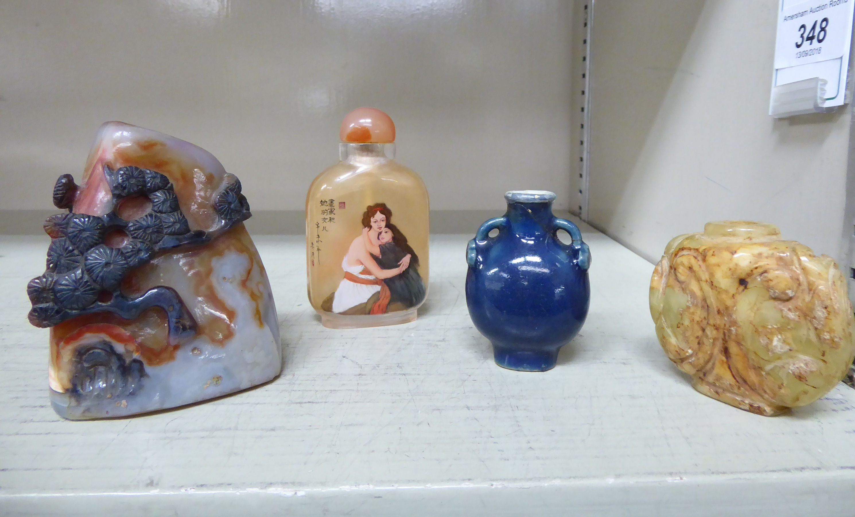 Oriental artefacts: to include a late 19thC Chinese porcelain miniature blue glazed vase 2.
