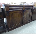 A late Victorian mahogany chiffonier, the two frieze drawers over a pair of panelled doors,