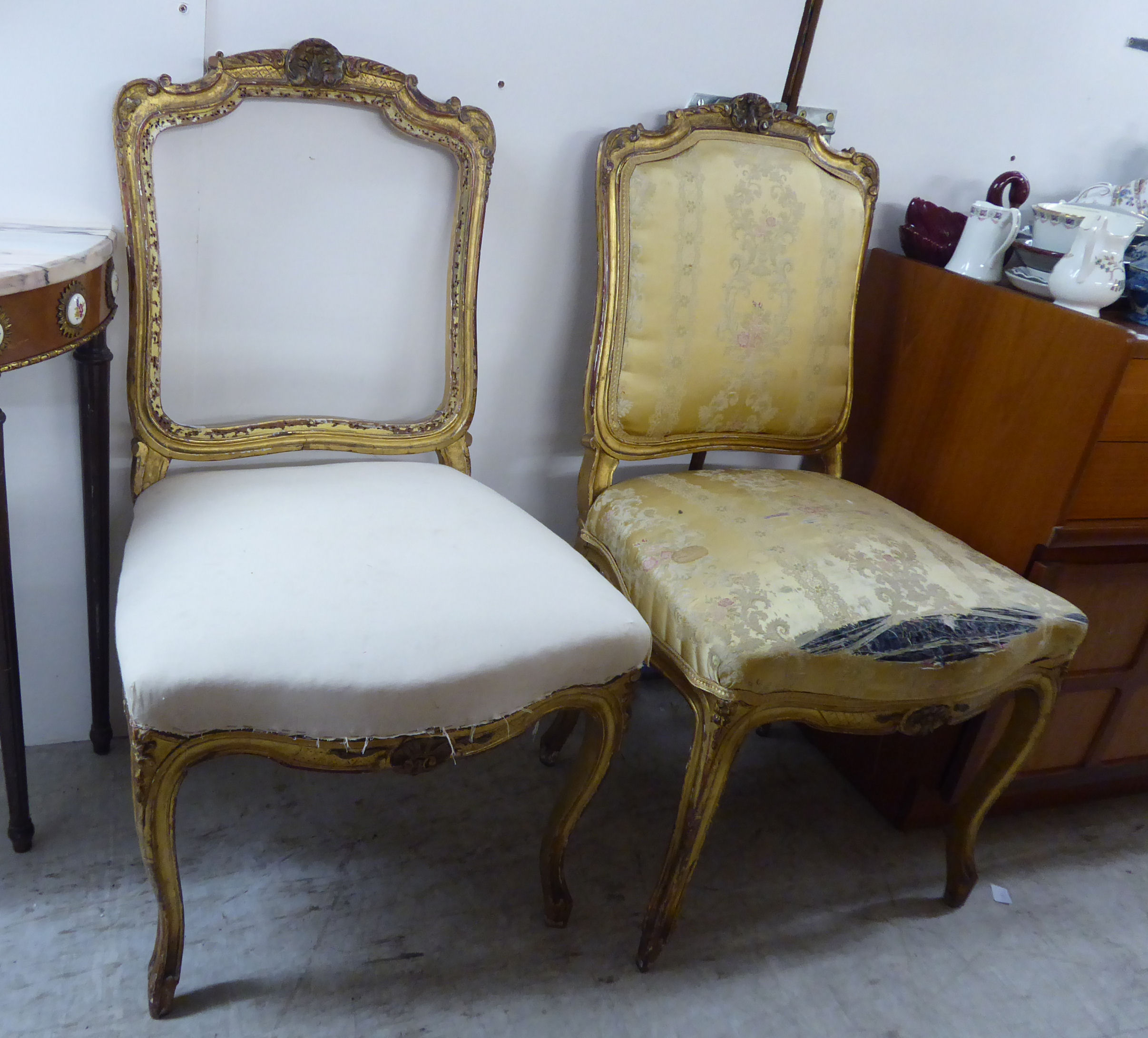 Two similar late 19thC (possibly French) giltwood framed parlour chairs,