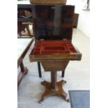 A Regency rosewood and satin marquetry work table, the hinged,