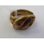 A 9ct gold ring, fashioned as two serpents,