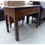 An early 19thC oak architect's table, the mitred top over a shallow, compartmented drawer,