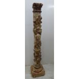 An early 19thC foliate carved and painted pine pedestal,