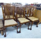 A set of six 20thC mahogany framed Chippendale inspired splat-back dining chairs,