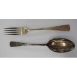 A two piece spot-hammered silver Christening set, a fork and spoon, in a fabric lined,