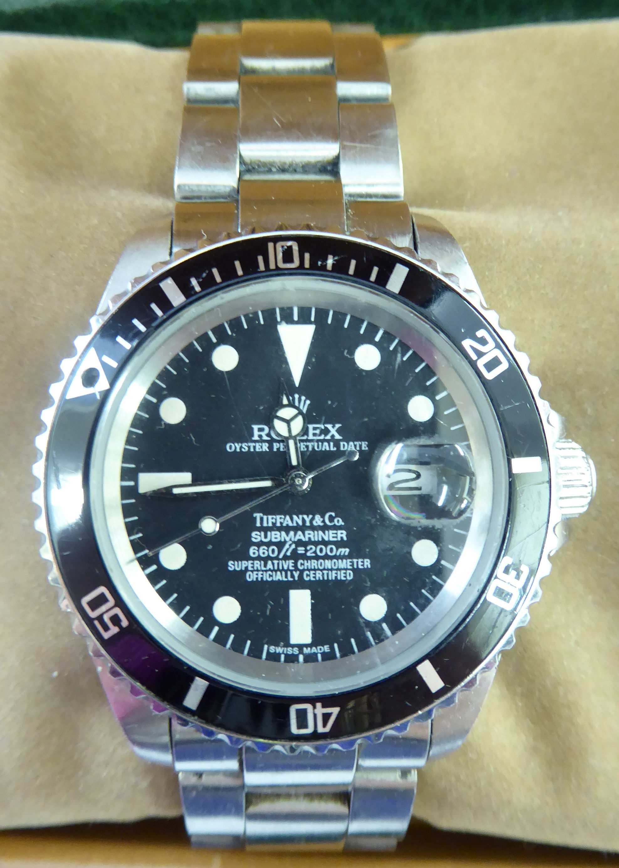 A replica Rolex Oyster Perpetual Date submariner wristwatch,