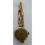 An early 20thC 9ct gold cased bracelet watch,