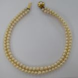 A cultured pearl double row necklace,