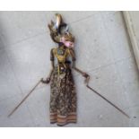 A 20thC Indonesian painted wooden puppet,