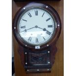 An early 20thC mother-of-pearl inlaid fruitwood wall clock;