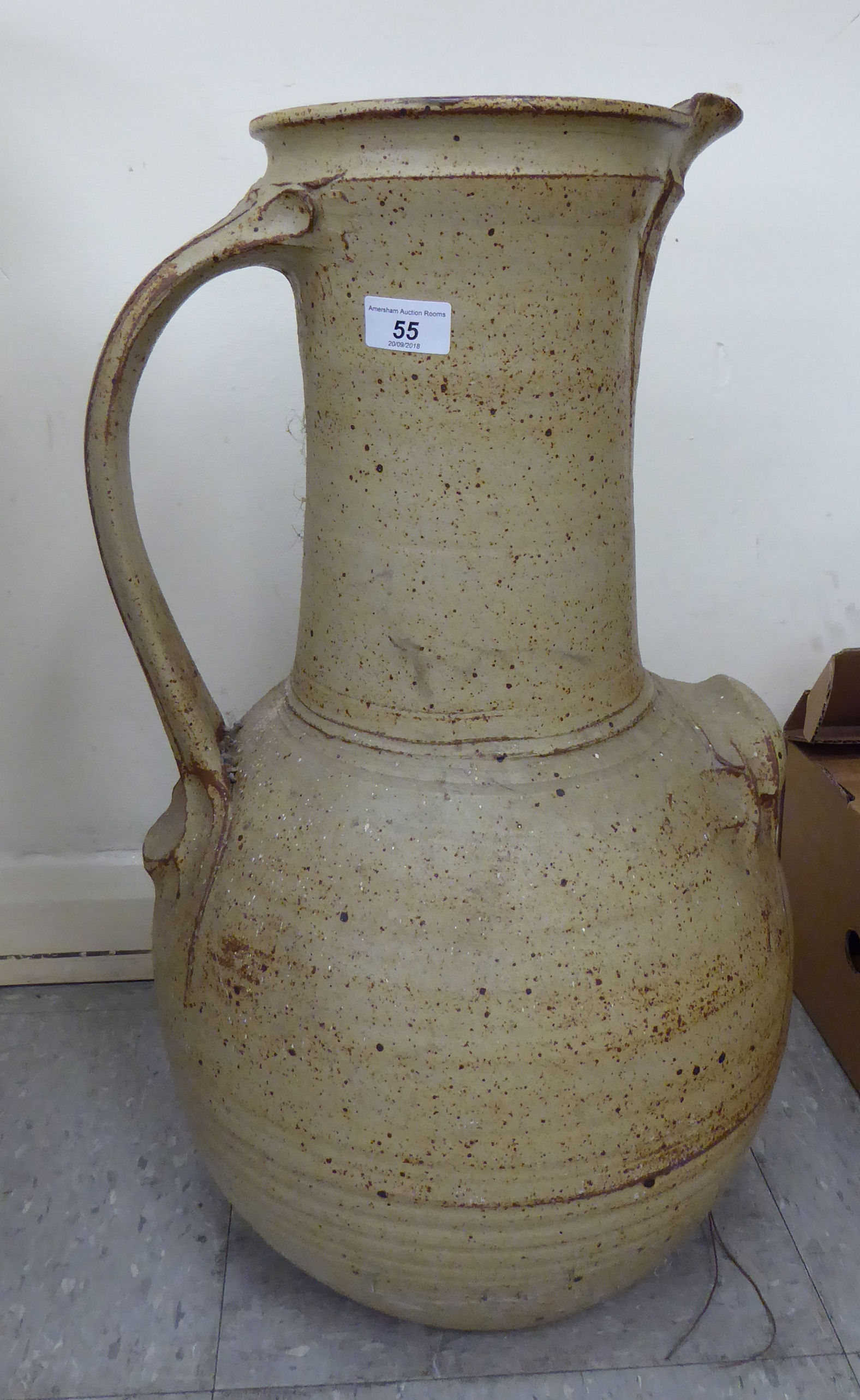 A studio pottery ewer bears an indistinct stamp 23''h CA