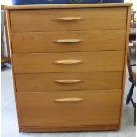 A 1970s teak finished five drawer dressing chest,