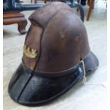 An early 20thC Scottish firefighter's moulded,