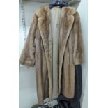 A light brown three-quarter length fur coat RSM