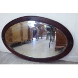 A 1920/30s mirror, the oval,