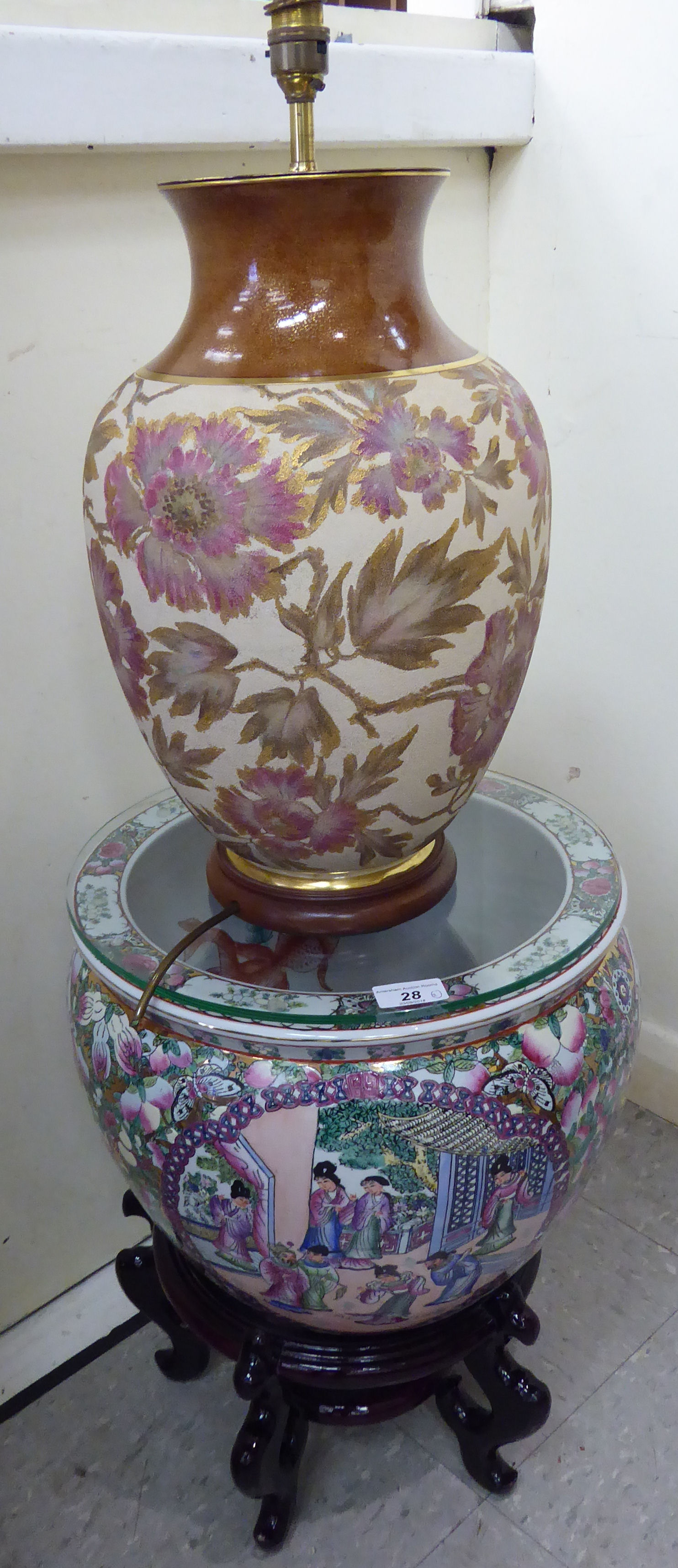 A modern Chinese porcelain jardiniere, decorated with figures and flora,