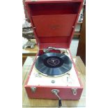 A mid 20thC Decca 50 wind-up tabletop gramophone, in a canvas bound case 6''h 11.