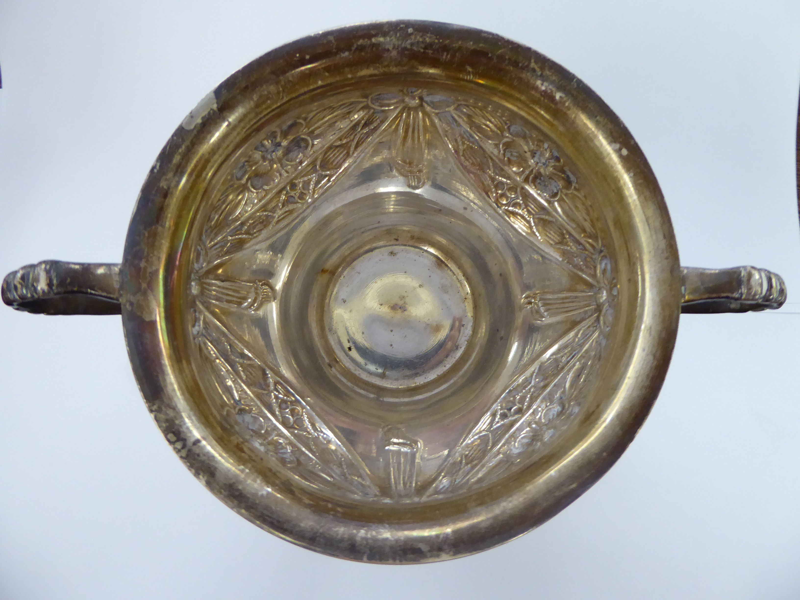 A silver bowl of pear design with a flared rim and opposing beaded loop handles, embossed flora, - Image 2 of 3