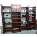 A modern Chinese teak modular living room unit, comprising an arrangement of open shelves,