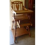A child's Victorian style honey coloured stained pine framed metamorphic high chair,