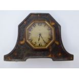 An early 20thC silver and tortoiseshell cased timepiece;