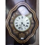 An early 20thC painted and glazed cased wall clock;