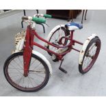 An early 20thC red painted metal framed tricycle with 14'' wheels S