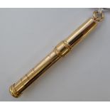 A 10ct gold cased propelling pencil Birmingham stamped 12.