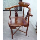 A modern Chinese exotic hardwood framed, twin splat-back corner chair,